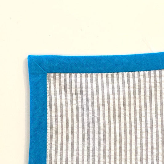 Using Bias Binding To Bind A 90 Degree Corner - Sewing Gem